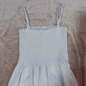 White babydoll dress with adjustable straps from garage no tag but a size medium